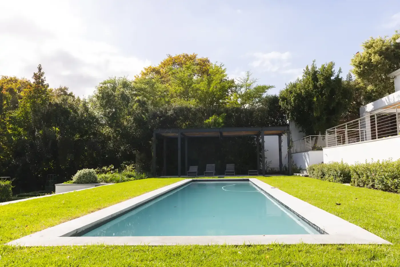 Renovated pool and deck surround at a Toronto area home after surface restoration work