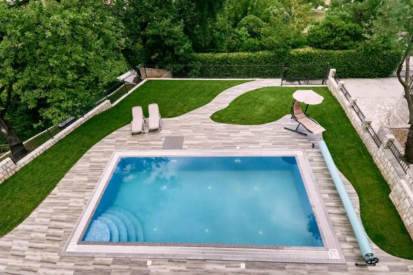 Inground pool in the GTA being maintained with clean filtration during a seasonal service visit