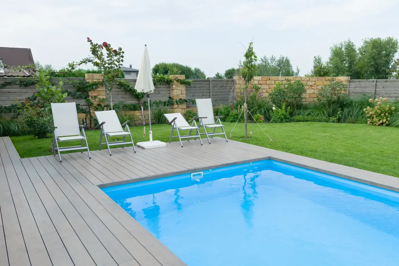 Backyard pool planner tool showing a fenced Ontario yard with an inground pool and deck