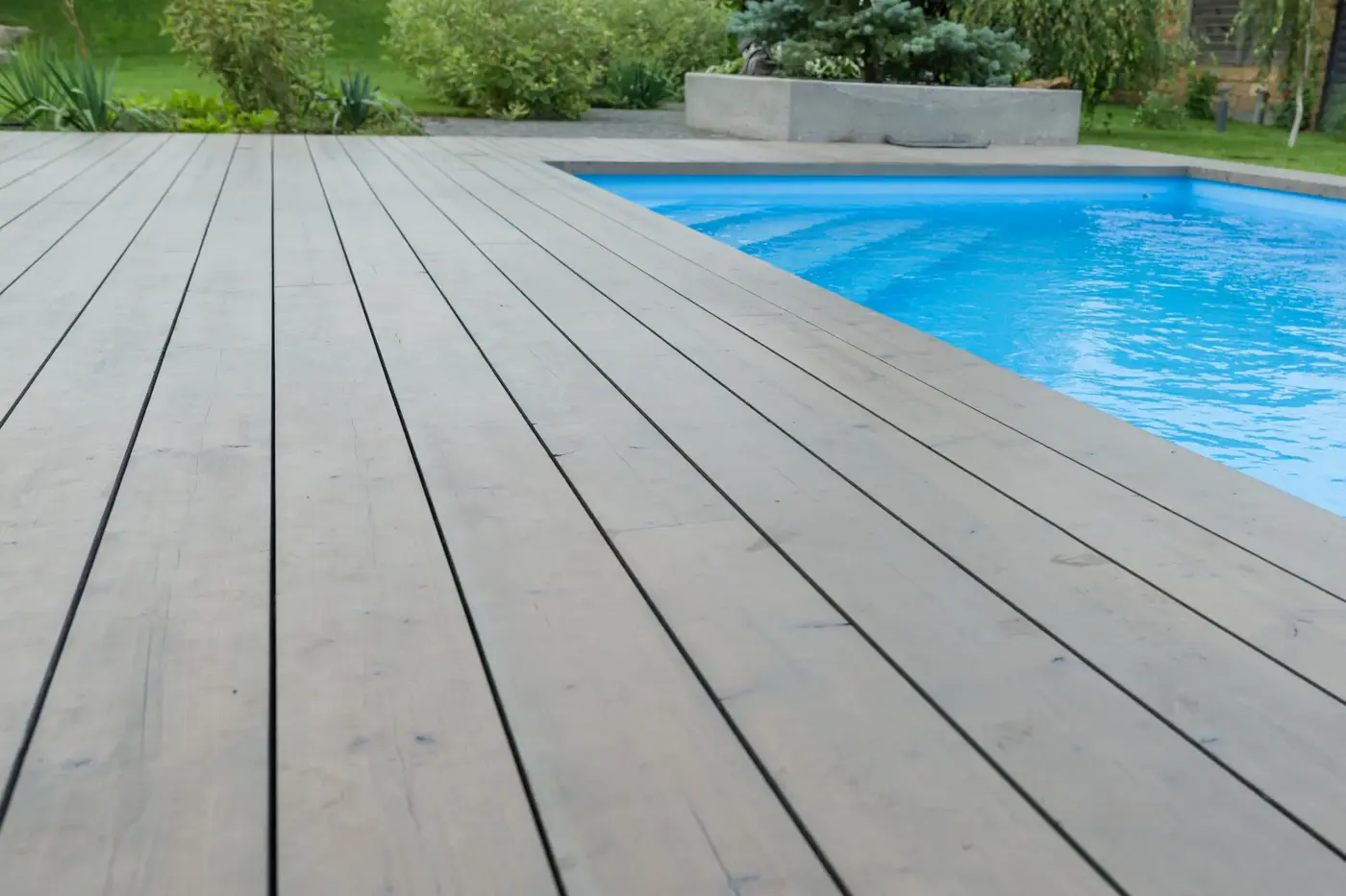 Pool liner being fitted and smoothed during installation in Toronto GTA